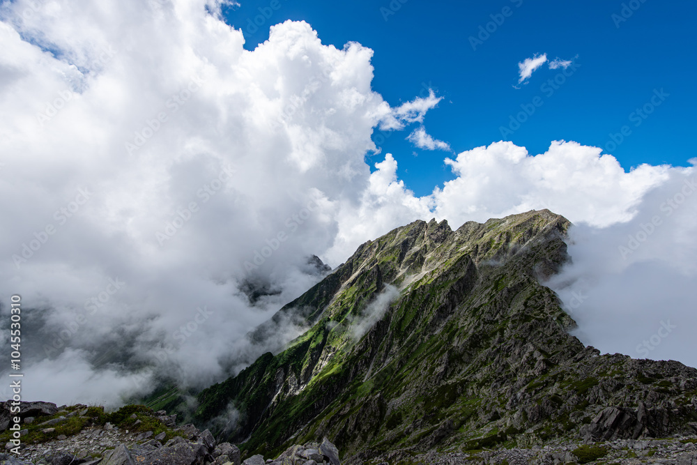 長野県と岐阜県にまたがる北アルプスにある穂高岳連峰の雲の切れ間その2A break in the clouds of the Mt. Hotaka mountain range in the Northern Alps straddling Nagano and Gifu Prefectures, Part 2 長野県と岐阜県にまたがる北アルプスにある穂高岳連峰の雲の切れ間その2A break in the clouds of the Mt. Hotaka mountain range in the Northern Alps straddling Nagano and Gifu Prefectures, Part 2