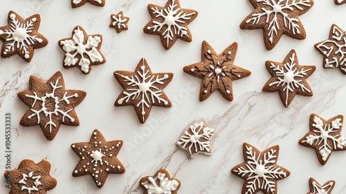 Close-up Photo of Gingerbread Cookies Shaped Like Stars with Intricate Icing Designs on a Marble Surface