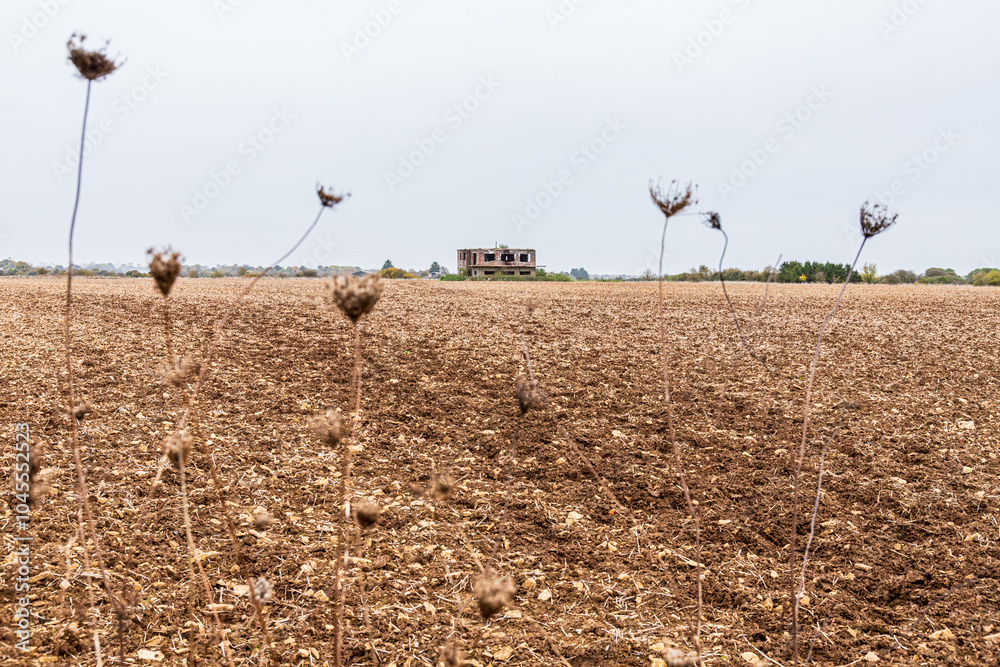 The remains of the control tower of the Second World War airfield of RAF Broadwell near the village of Kencot, Oxfordshire, England UK