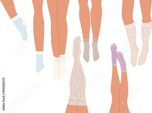 Flat vector set of legs in different socks lying on the floor.