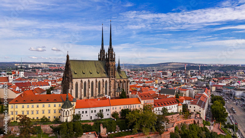 Wallpaper Mural Brno, Czech Republic. Cinematic Aerial view to the Roman Catholic cathedral. Originally medieval in gothic style, many renovations, High towers added in Gothic revival between 1901-1909. Aerial view.  Torontodigital.ca