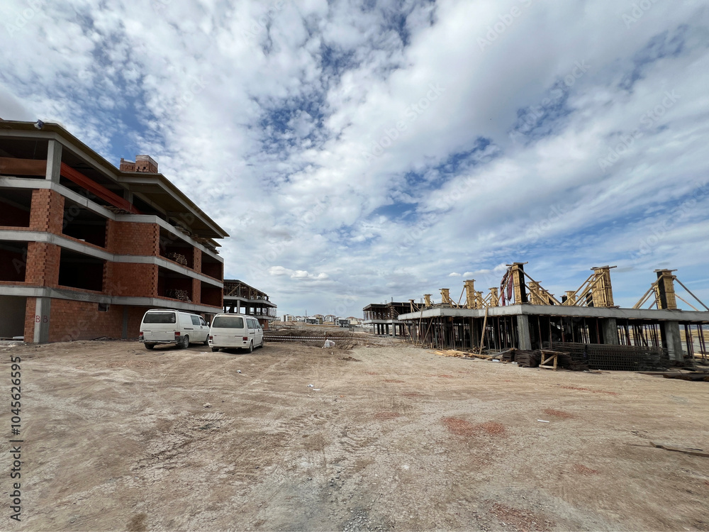 Obraz premium Concrete building skeleton, construction phase.
