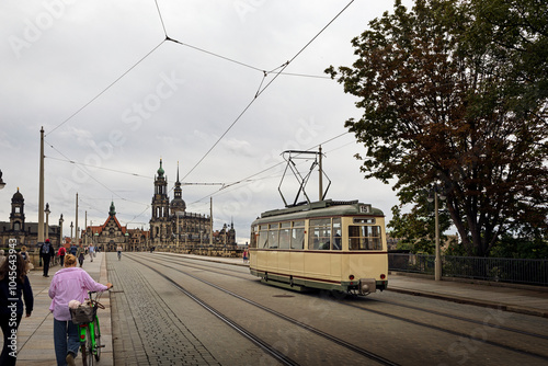 Abert Bridge with Streetcar Passing in Foreground, Framing Dresden Skyline and Historic Hofkirche Church, Capturing Urban Transit and Iconic Architecture