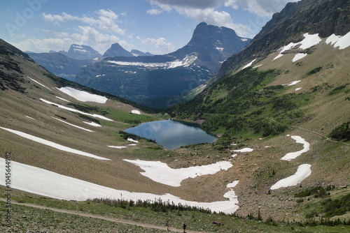 ptarmigan lake on the trail to Ptarmigan Tunnel at the Glacier national park, Montana, USA. photo