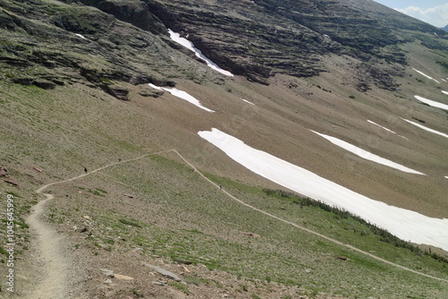 ptarmigan lake on the trail to Ptarmigan Tunnel at the Glacier national park, Montana, USA. photo