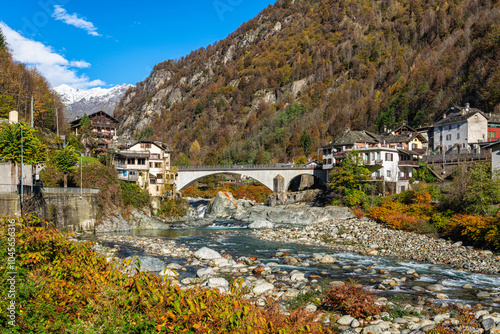 The beautiful village of Piode, during fall season, in Valsesia (Sesia Valley). Province of Vercelli, Piedmont, Italy.