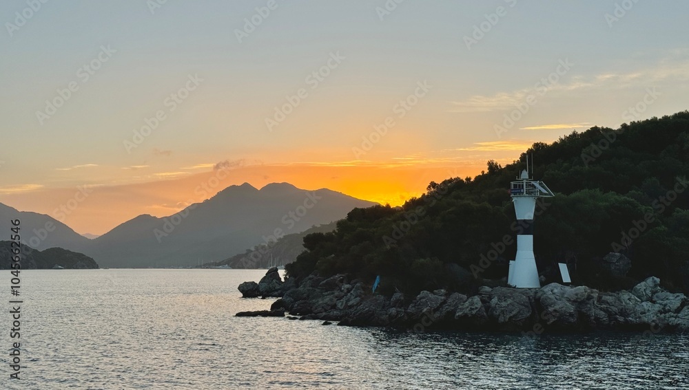 Sunrise on the island with its lighthouse in Turkey