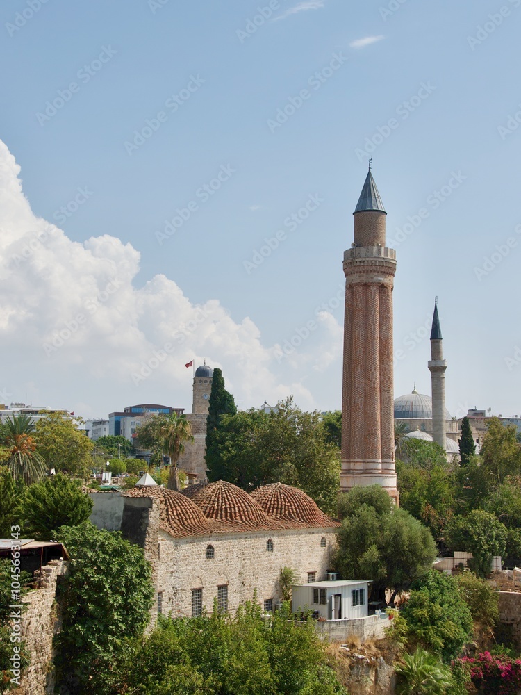 An ancient mosque with its minaret in the old town of Antalya, Turkey