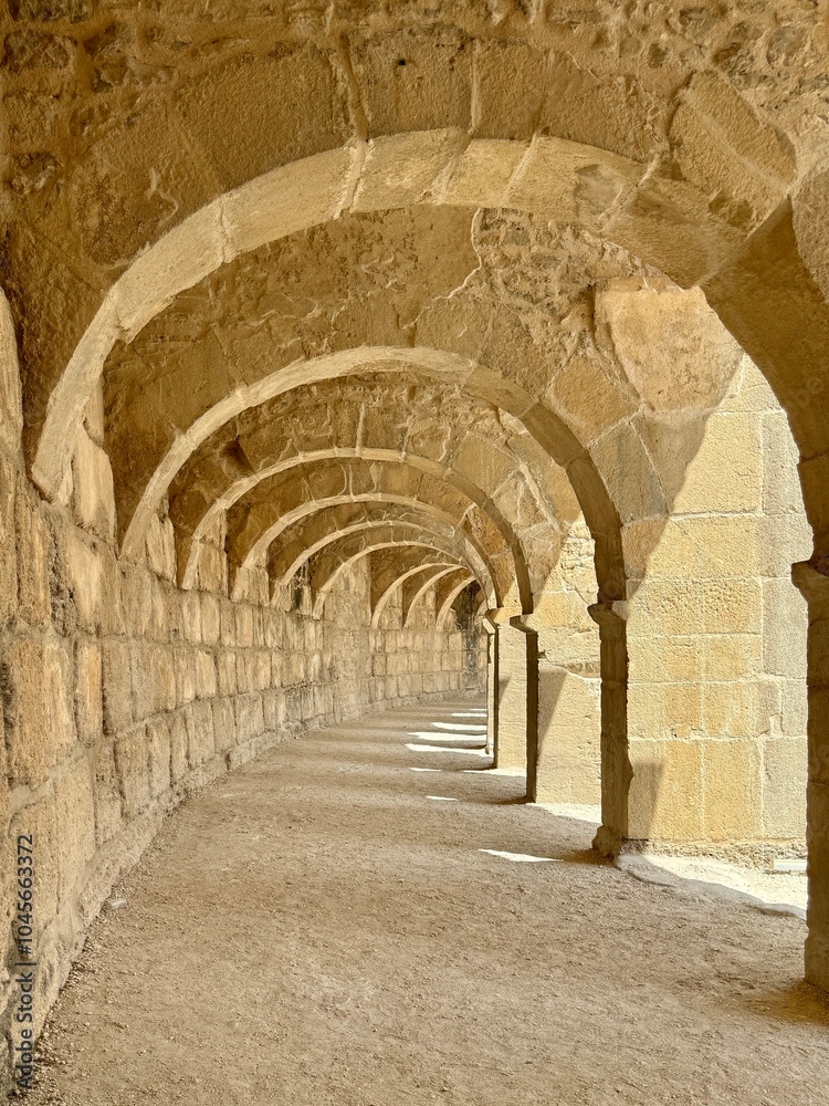 Arched hallway on top of the Roman theater in ancient Greco-Roman city of Aspendos, Turkey