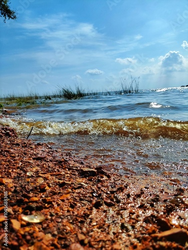 beautiful wallpaper of water wave breaking into shore