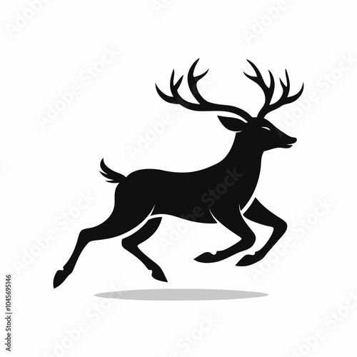 Silhouette of a deer in mid-run with antlers clearly visible.