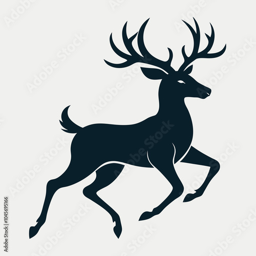 Silhouette of a deer in mid-run with antlers clearly visible.