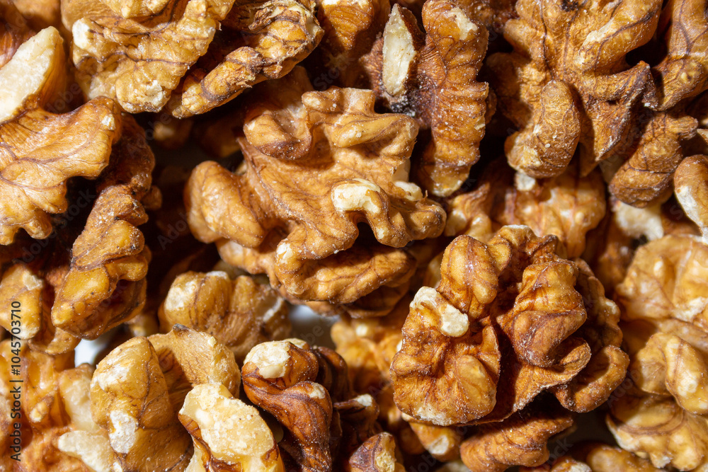 Scattered Shelled Walnuts. Background from Walnut. Natural High-Calorie Snacks Scattered Shelled Walnuts. Background from Walnut. Natural High-Calorie Snacks