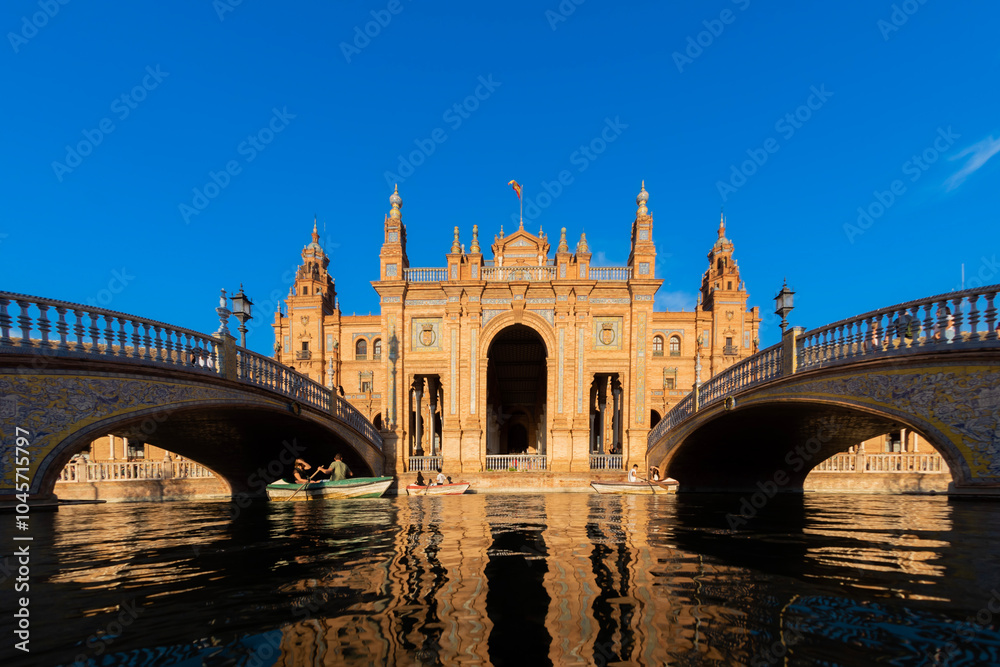 Plaza de España is an architectural complex located in María Luisa Park in the city of Seville (Andalusia, Spain). Plaza de España is an architectural complex located in María Luisa Park in the city of Seville (Andalusia, Spain).