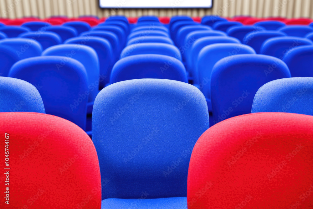 Vibrant auditorium seats in blue and red Vibrant auditorium seats in blue and red
