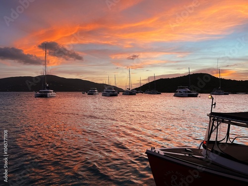 Colorful sunset on the water from a boat in the Caribbean.