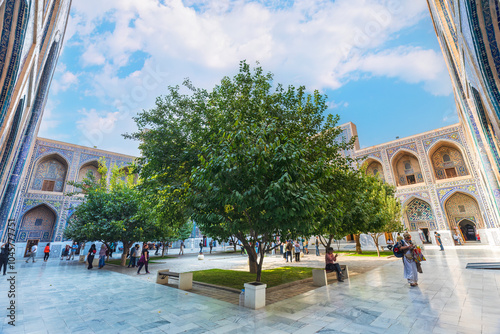 Samarkand, Uzbekistan - October. 10. 2024: The courtyard of one of the madrasahs on Registan Square photo