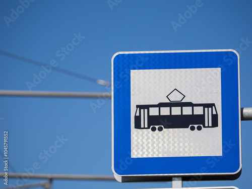 Modern tram stop sign with light reflective coating.