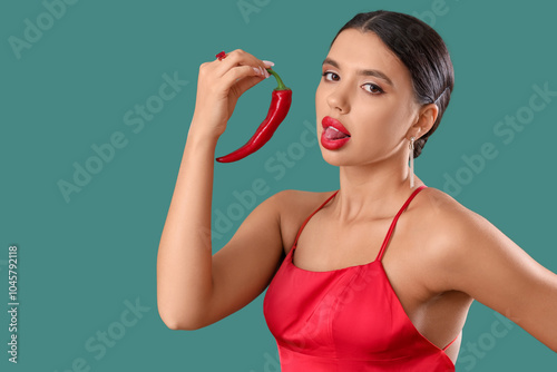 Sexy young woman in red dre...