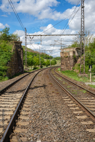 Obraz na płótnie Railway outdoors on beautiful summer day. Industrial landscape with rails and railway. w salonie