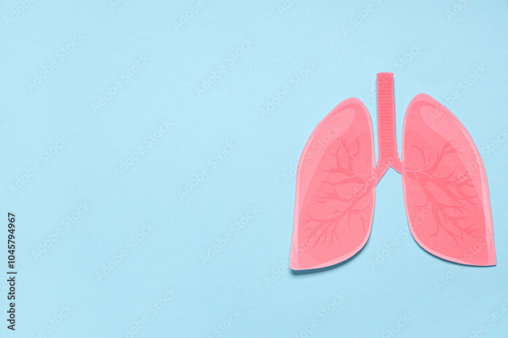 Paper lungs on blue background Paper lungs on blue background