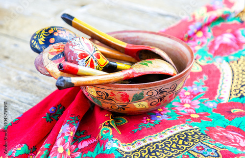 Handmade wooden tableware. Wooden bowl with spoons