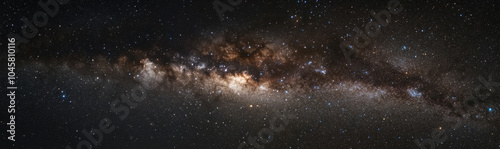 A breathtaking panoramic view of the Milky Way Galaxy at night, showcasing its majestic spiral arms and celestial wonders. This image captures the beauty of the cosmos and its countless stars, nebulae