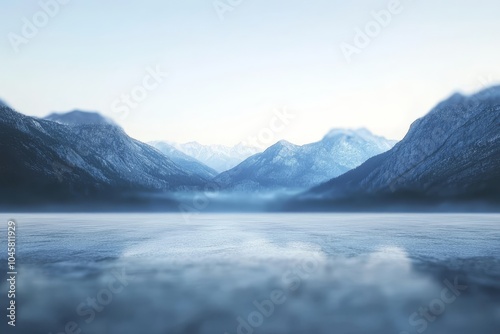 Serene Mountain Lake with Smooth Floor, a tranquil landscape with a smooth floor reflecting the snow-capped mountains and the clear blue sky above. The mist adds a layer of mystique and beauty to the 