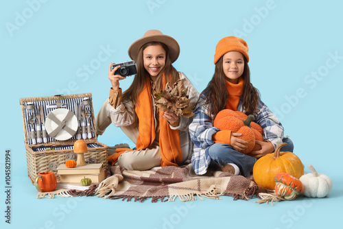 Cute girls in autumn clothe...