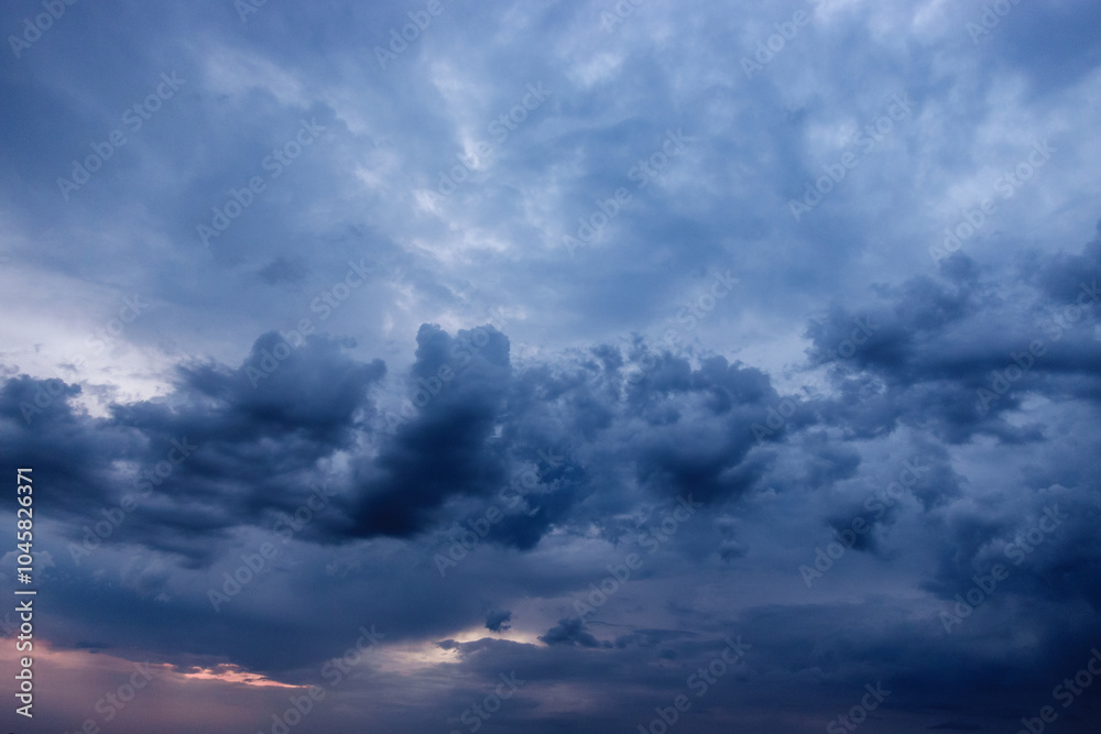 Obraz premium Dramatic Storm Clouds in Sunset. Climate Change and Global Warming 