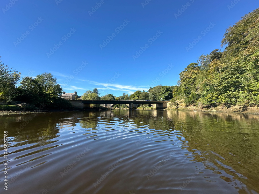 Fototapeta premium Warkworth bridge over the river Coquet in Northumberland