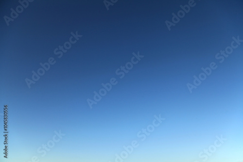 Atmosphere and clear sky. Blue-sky with a yellow glow after sunset. Blue sky and good weather in autumn. Deep blue cloudless sky. Clear weather in late autumn. Deep-blue color of sky in fall time