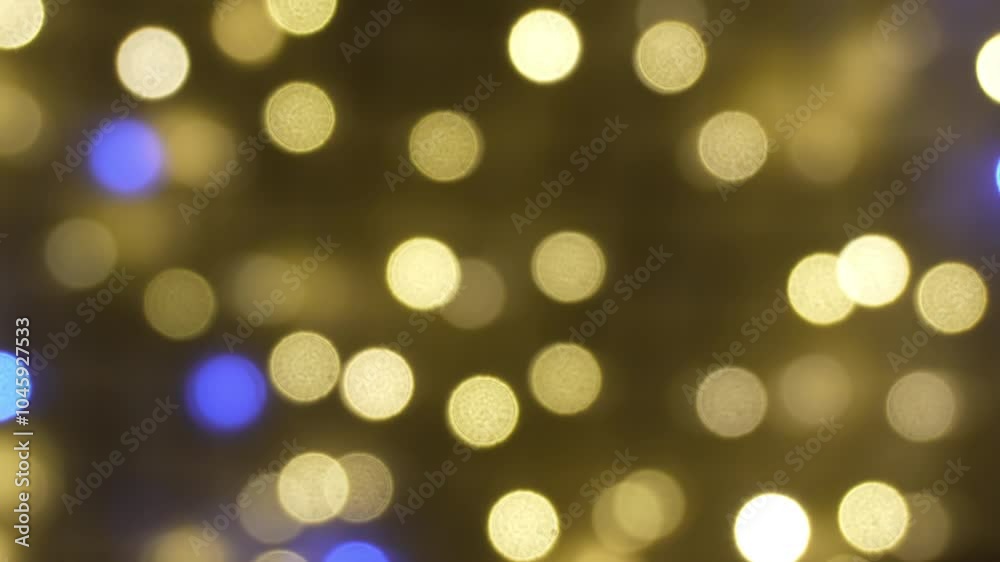 Defocused abstract yellow blue glowing lights bokeh background. Nice background for Christmas or romantic project. Defocused abstract yellow blue glowing lights bokeh background. Nice background for Christmas or romantic project.