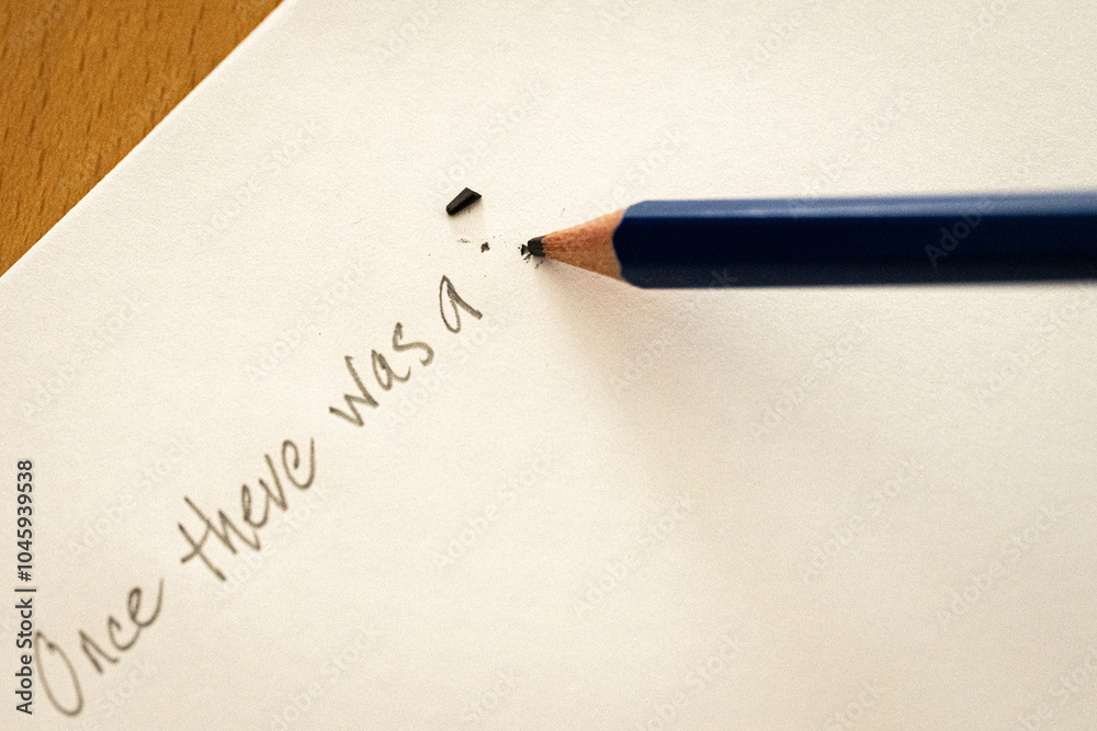 Pencil writing a story. Broken pencil. Desktop writing. Pencil writing a story. Broken pencil. Desktop writing.