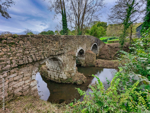 Roman bridge called Romanon bridge over Nora river, Pola de Siero, Asturias, Spain photo