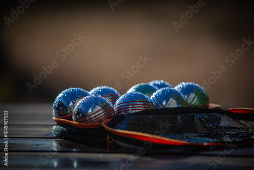 Boules covered in droplets of dew.