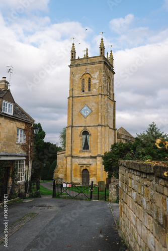 Autumnal English Village with Limestone Cottages and Autumn Trees - Quintessential Filming Location for Father Brown in Blockley, Gloucestershire in The Cotswolds photo