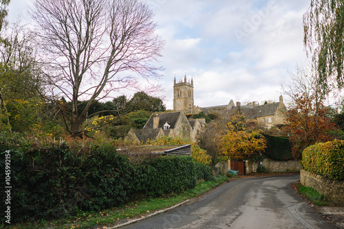 Autumnal English Village with Limestone Cottages and Autumn Trees - Quintessential Filming Location for Father Brown in Blockley, Gloucestershire in The Cotswolds photo