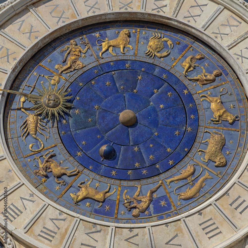 Naklejka premium Close up Blue Dial With Gold Symbols of Zodiac Famous Clock Tower Historic Landmark in Venice Italy