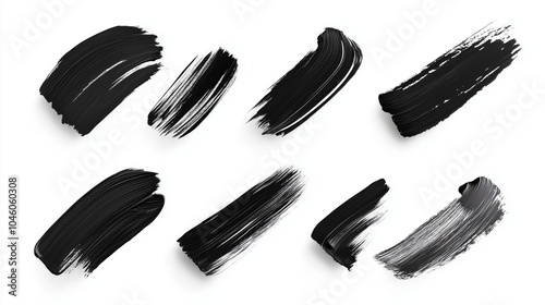 Set of black brush strokes isolated on white.