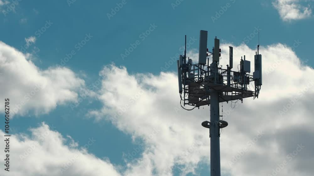 5g mobile network communication tower with cellular antenna transmitter and receiver, broadcasting 4g lte equipment, phone network station on sky with clouds background 4k 5g mobile network communication tower with cellular antenna transmitter and receiver, broadcasting 4g lte equipment, phone network station on sky with clouds background 4k