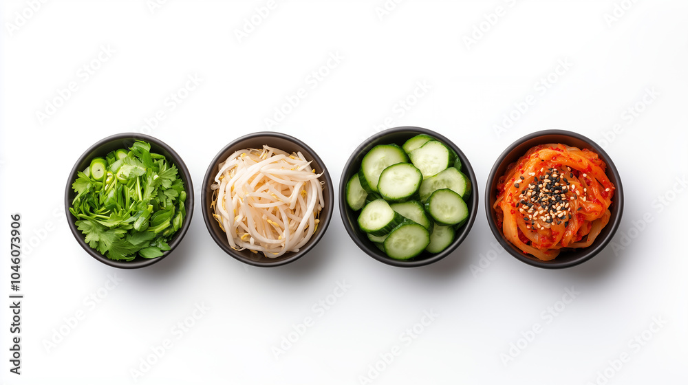 Fresh herbs and vegetables are beautifully arranged in black bowls, showcasing vibrant colors and textures. This image features cilantro, bean sprouts, cucumber slices, and kimchi. Fresh herbs and vegetables are beautifully arranged in black bowls, showcasing vibrant colors and textures. This image features cilantro, bean sprouts, cucumber slices, and kimchi.