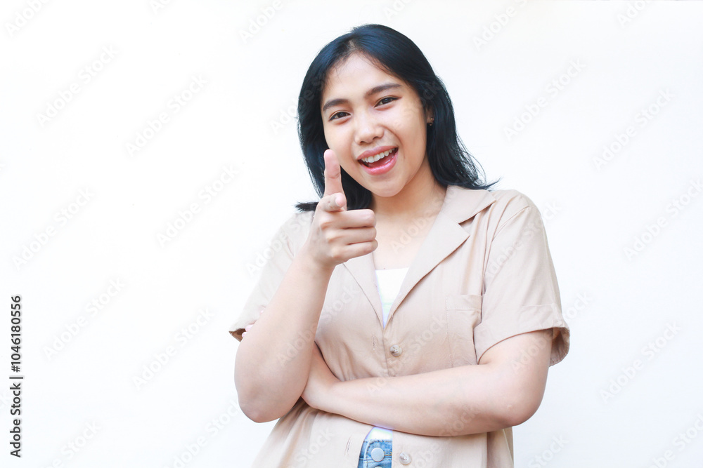 excited asian woman pointing finger showing presenting gesture wearing casual clothes isolated on white background excited asian woman pointing finger showing presenting gesture wearing casual clothes isolated on white background