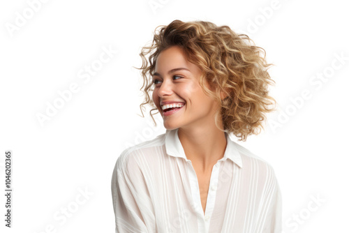 Casual portrait of a woman in a summer outfit looking over her shoulder with a playful expression against a clean white background.