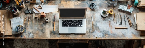 A laptop rests on a rustic workbench cluttered with art supplies, tools, and materials, suggesting an active creative environment. Generative AI