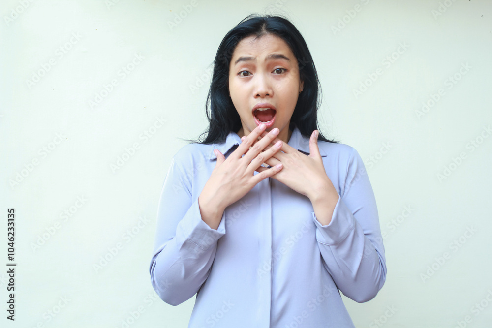 shocked asian young woman wearing formal office clothes stunned looking at camera, covering her mouth wide open standing over isolated white background shocked asian young woman wearing formal office clothes stunned looking at camera, covering her mouth wide open standing over isolated white background