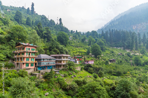 Small villages and colorful local houses nested in the hills of Parvati valley at manikaran, himachal pradesh, India.