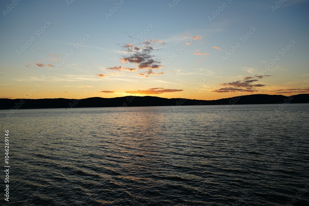 Obraz premium sunset over the river