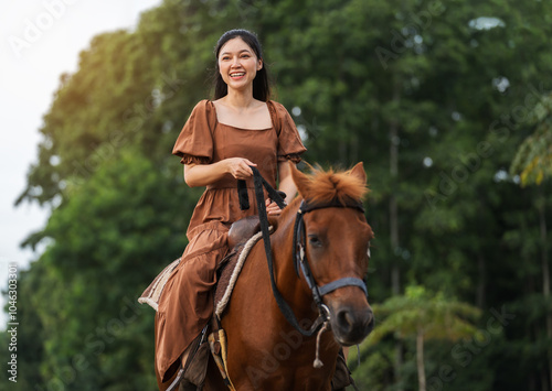 happy woman riding horse on meadow field