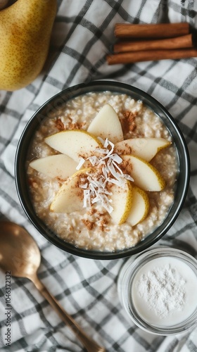 Oatmeal with Pear Slices, Coconut Flakes, and Cinnamon photo